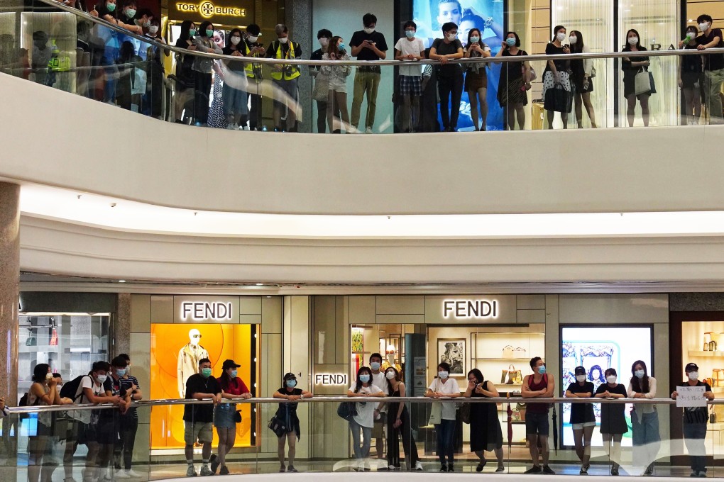 People gather at the Times Square shopping mall during an anti-government protest in Causeway Bay, on Hong Kong’s Chief Executive Carrie Lam Cheng Yuet-ngor's birthday. A new security law proposed by Beijing is fueling concerns about more unrest in the city and stock losses. Photo: Sam Tsang