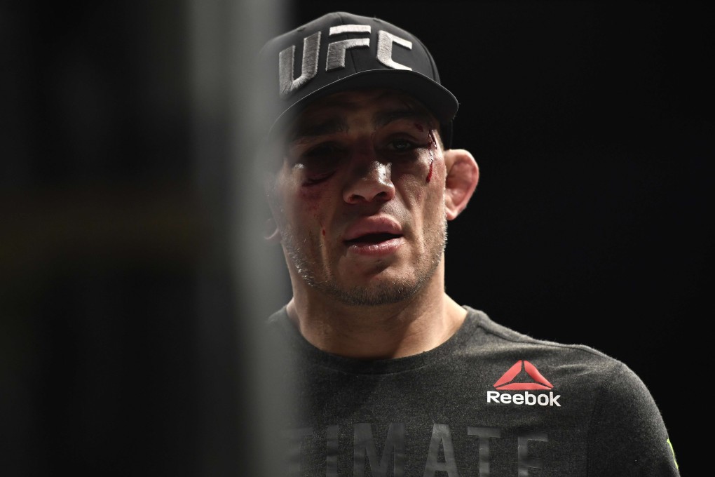 A bruised Tony Ferguson looks on after his devastating defeat by Justin Gaethje. Photo: AFP