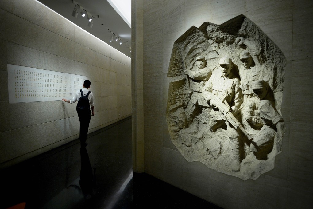A man walks past a sculpture as he visits the Museum of the War of the Chinese People’s Resistance Against Japanese Aggression in July 2015, during ceremonies opening an exhibition marking the anniversary of the 1937 Marco Polo Bridge Incident. The skirmish on July 7, 1937 served as pretext for Tokyo’s forces to seize Beijing, triggering eight years of full-scale war, in which more than 20 million Chinese are believed to have died. Photo: AFP