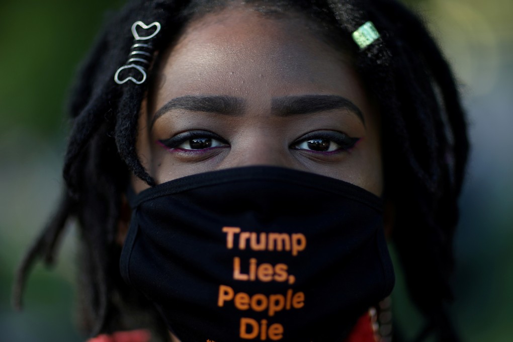 Demonstrator Jasmine Wilson poses for a portrait as she takes part in a nationwide “mass funeral protest” involving artificial body bags laid outside the White House on Wednesday. Photo: Reuters