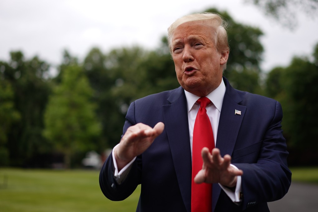US President Donald Trump speaks to the press as he departs from the White House for Michigan on Thursday. Photo: AFP