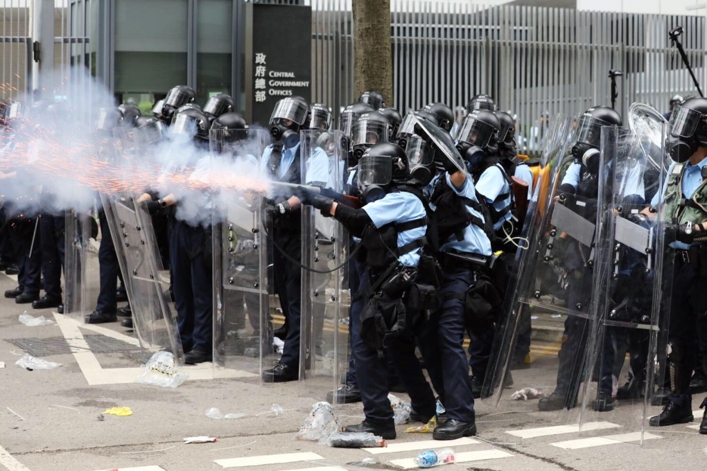 Police fire tear gas at protesters on June 12, 2019. Photo: Sam Tsang
