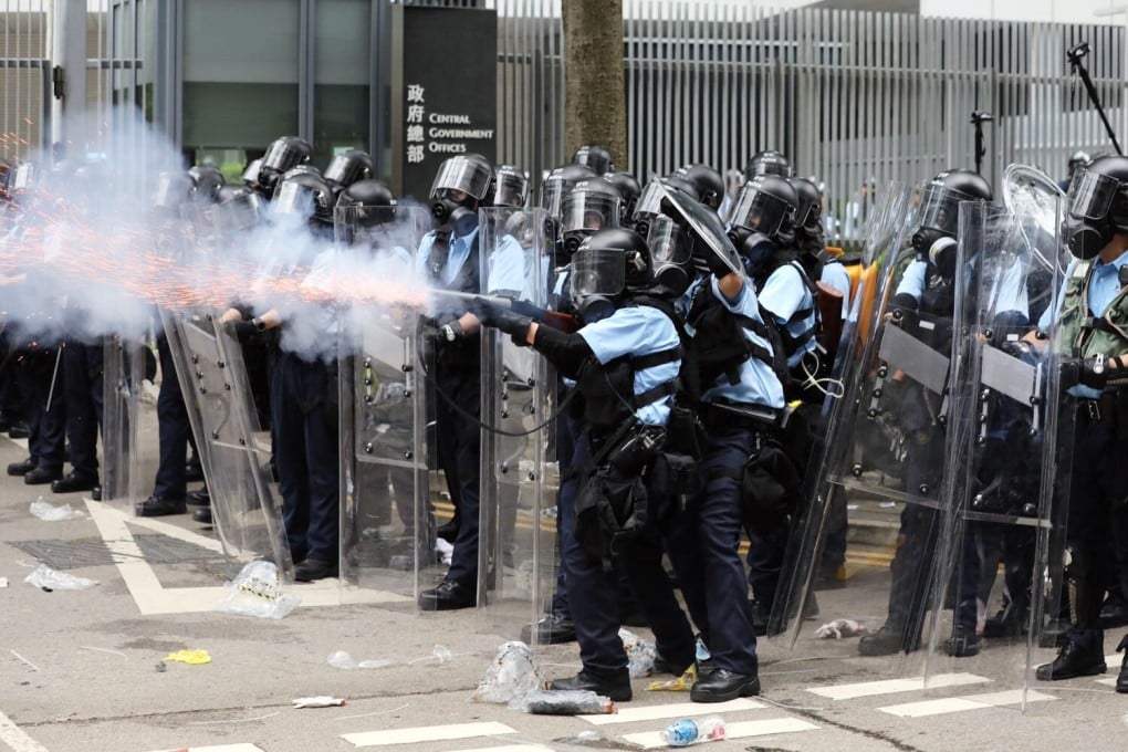 Police fire tear gas at protesters on June 12, 2019. Photo: Sam Tsang