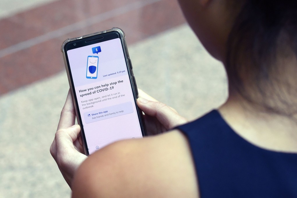 Singapore’s foreign minister says the government wants to avoid “a false dichotomy” between a Big Brother type centralised system and a free-for-all decentralised system for its contact tracing app. Photo: AFP