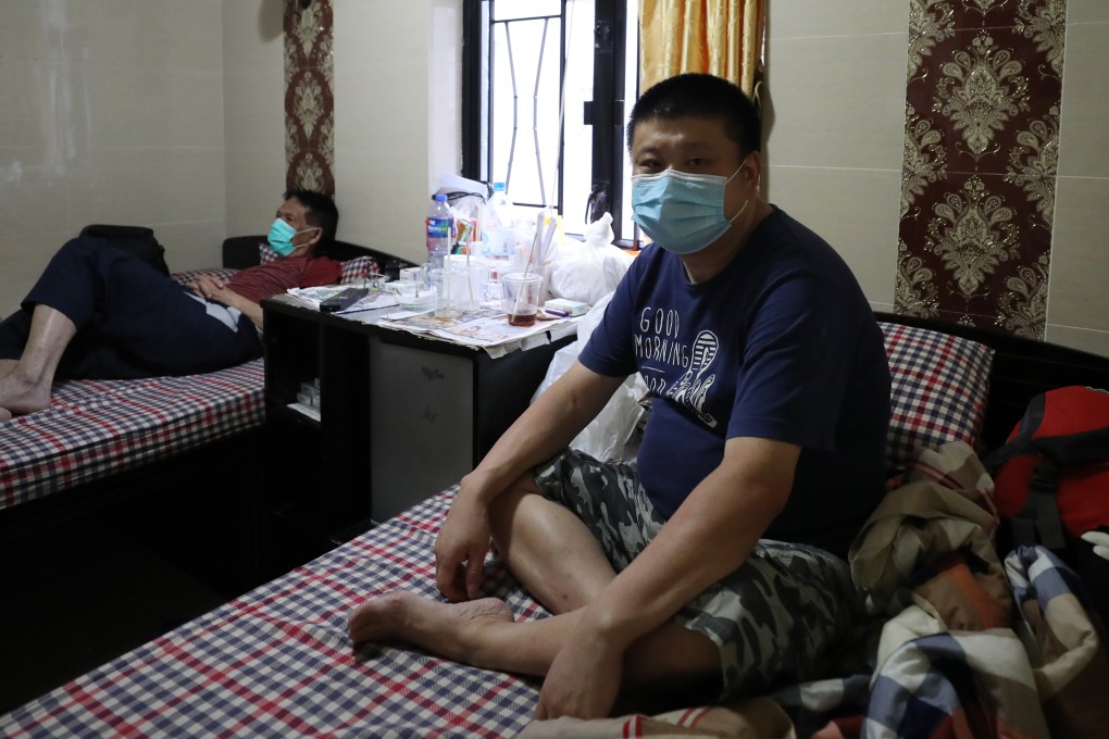 Chu Lui, who lived in Shenzhen and worked in Hong Kong before the coronavirus pandemic, in his room at Chungking Mansions, Tsim Sha Tsui. Photo: Nora Tam