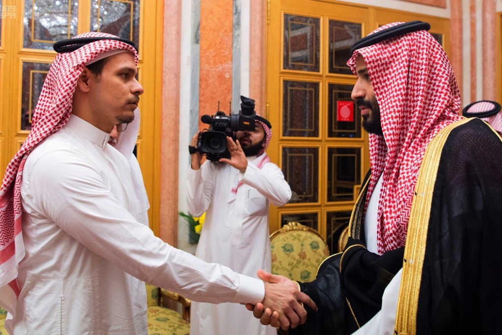 Salah Khashoggi, left, a son of Jamal Khashoggi, shakes hands with Saudi Crown Prince Mohammed bin Salman in Riyadh. Photo: Saudi Press Agency via AP