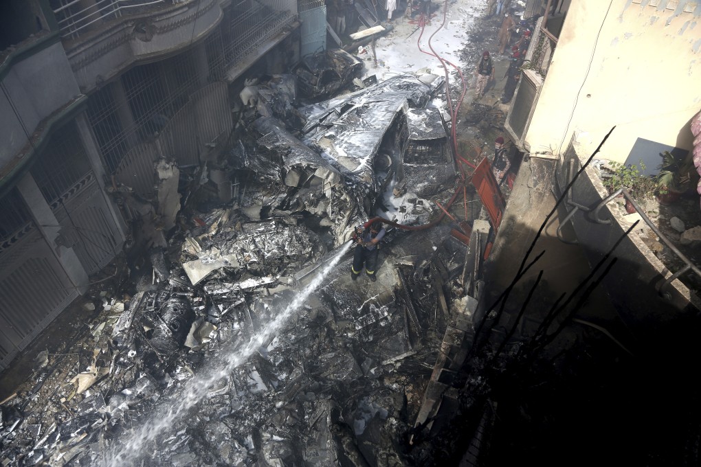 One of the two survivors of Friday’s plane crash in Pakistan has described jumping from the burning wreckage after it went down in a residential neighbourhood near Karachi’s international airport. Photo: AP