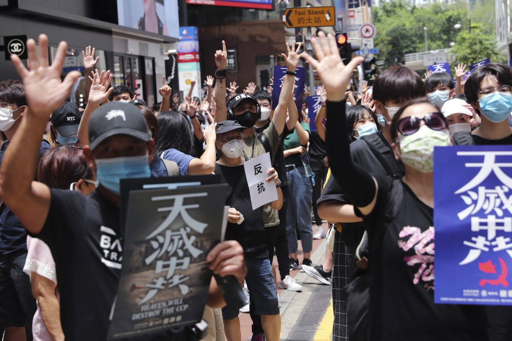 Protesters gather near Sogo department store in Causeway Bay for a march to protest against the central government’s proposed enactment of national security law. Photo: Sam Tsang