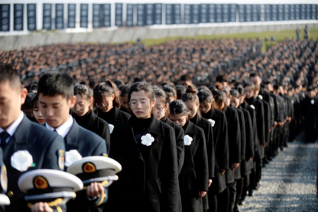 People attend a memorial ceremony marking the 82nd anniversary of the 1937 Nanking massacre in the city now known as Nanjing in Jiangsu province, China, on December 13, 2019. Photo: Reuters