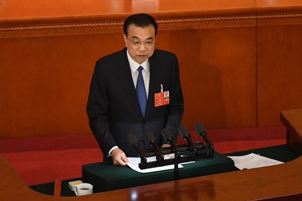 Chinese Premier Li Keqiang delivers his work report during a session of the National People’s Congress at the Great Hall of the People in Beijing on May 22. Photo: AFP
