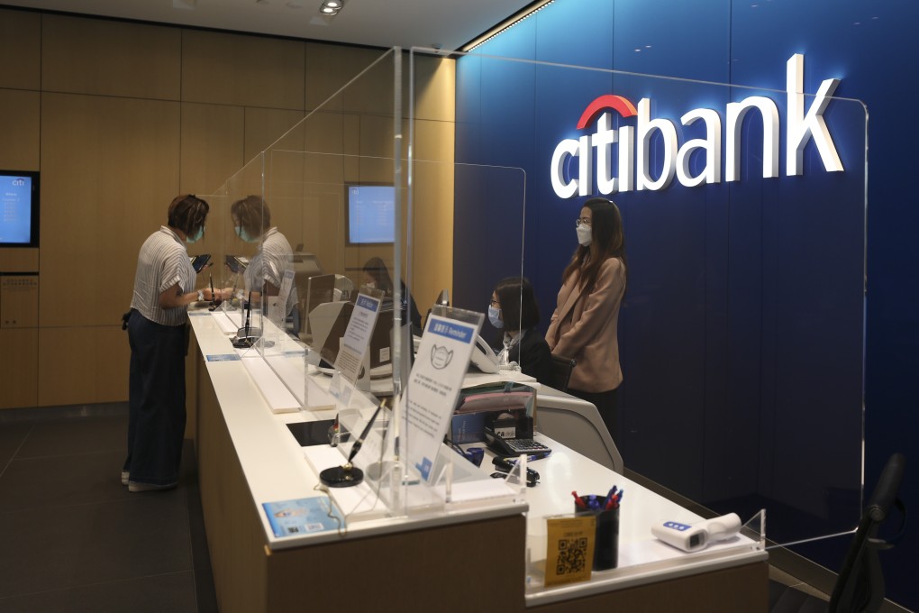 Desk shields set up at a counter at Citibank to prevent the spread of coronavirus, at Citi Tower, Kwun Tong. Banks across Hong Kong are adopting different strategies to prevent the spread of the virus. Photo: Xiaomei Chen