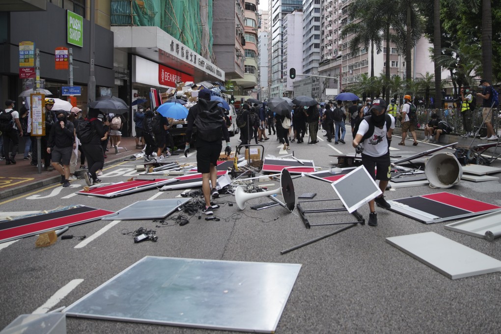 Protesters block traffic on Hennessy Road in Wan Chai during a march against Beijing’s planned national security law for the city. Photo: Winson Wong