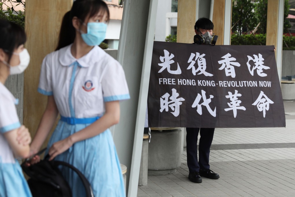 Students at Leung Shing Tak College stage a protest against two proposed laws for Hong Kong. Photo: Nora Tam