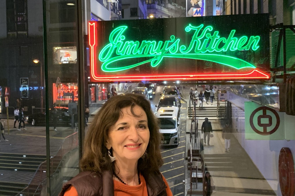 Barbara Harding and the restaurant’s Wyndham Street sign. Photo: courtesy of Barbara Harding