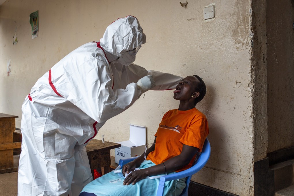 A health worker takes a nasopharyngeal swab sample during a Covid-19 testing drive at a school in Nairobi, Kenya. Photo: Bloomberg