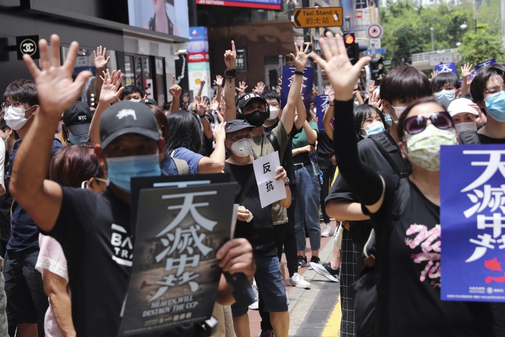 Protesters gather in Causeway Bay at the start of a march to Wan Chai on May 24 to protest against the central government’s proposed enactment of a national security law. The central government’s decision to enact the law instead of waiting for Hong Kong’s government to do so has triggered a new wave of protests in the city. Photo: Sam Tsang