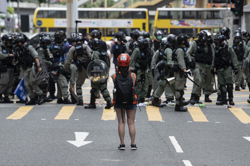 Riot police in Causeway Bay during a demonstration against Beijing’s national security law for Hong Kong. Photo: DPA