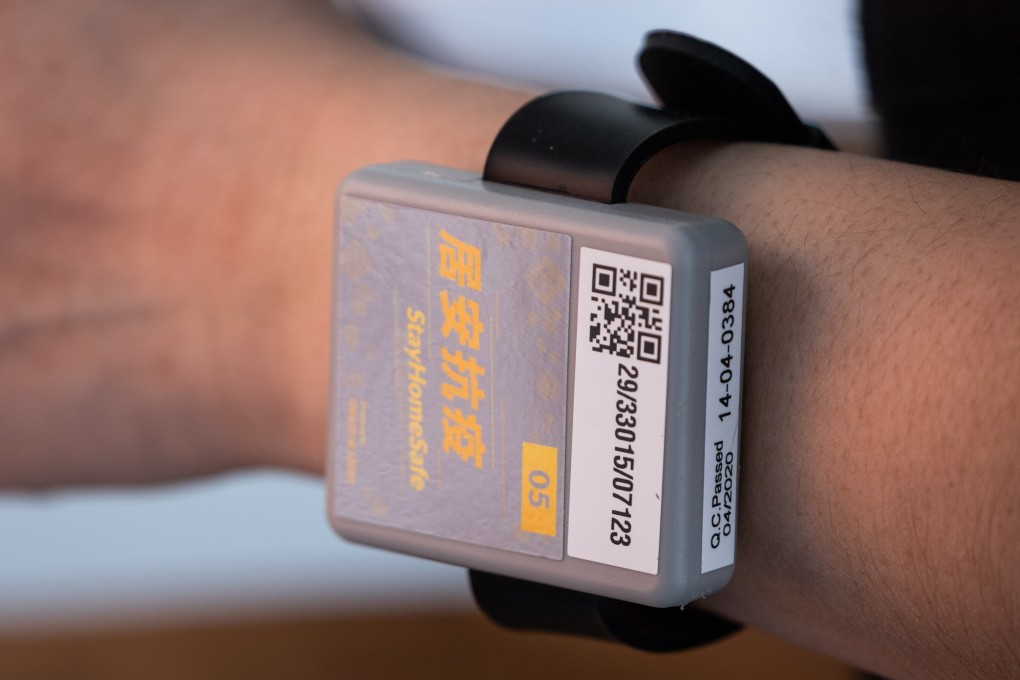 A tracking bracelet that monitors arrivals’ mandatory 14-day home-quarantine, in Hong Kong. Photo: EPA-EFE