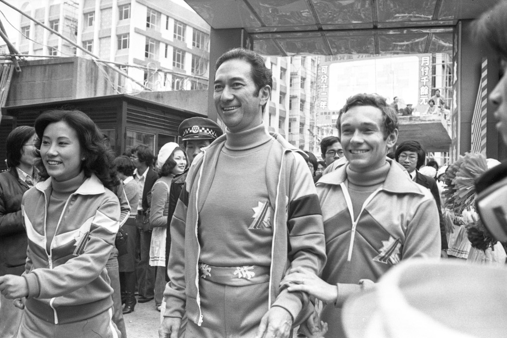 Stanley Ho, centre, and other celebrities are welcomed by cheerleaders and photographers at the finishing point of the Celebrity Relay Walkathon, a fund-raising event for the Community Chest, at the TVB headquarters in Hong Kong on January 29, 1978. Photo: SCMP