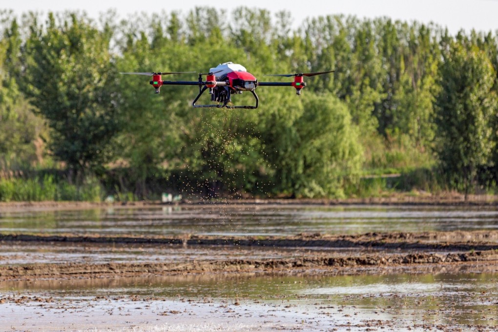 An XAG drone, attached with the company’s own JetSeed granule system, spreads rice seeds at a farm in the Zengcheng District of Guangzhou, capital of southern Guangdong province. Photo: Handout