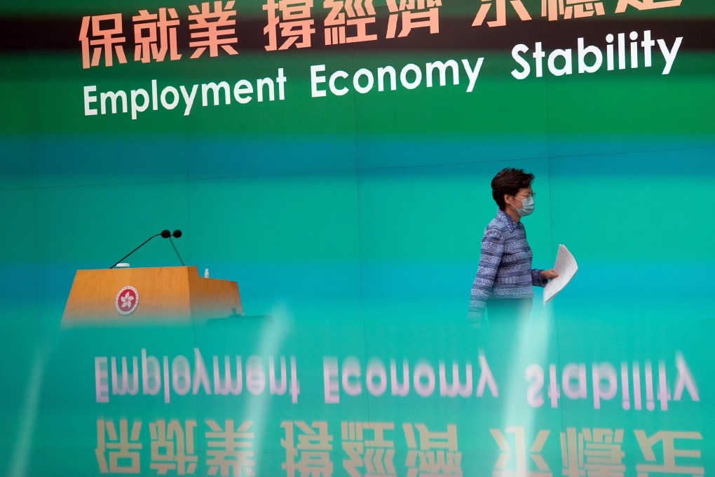 Chief Executive Carrie Lam leaves for an Executive Council meeting after meeting the press, at the Hong Kong government headquarters in Admiralty on May 26. Photo: Robert Ng