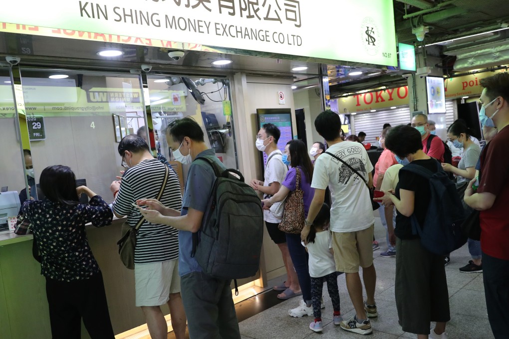 Queues formed at money changers in a number of Kowloon districts including at this shop in Tsim Sha Tsui. Photo: Edmond So