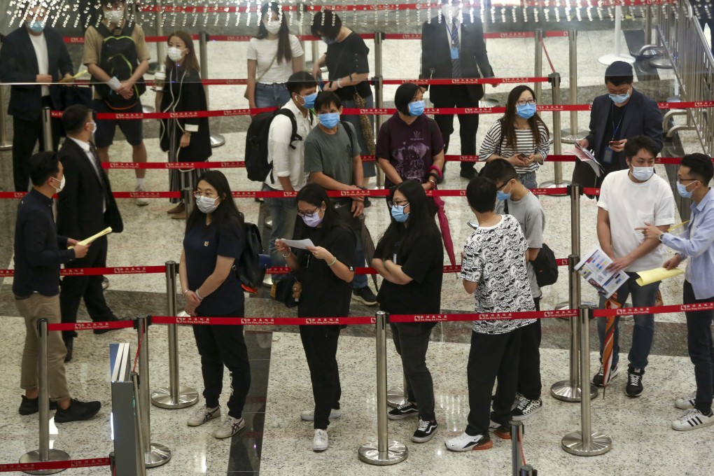 Home buyers lining up for phase two of the Wetland Seasons Park project sale at International Commerce Centre, Kowloon Station on 30 May 2020. Photo: Jonathan Wong