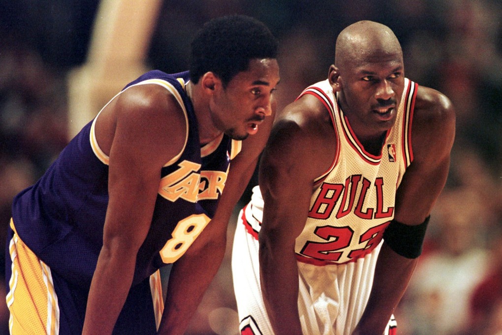 Los Angeles Lakers’ Kobe Bryant (left) and Chicago Bulls’ Michael Jordan talk during a 1997 NBA game. Photo: AFP