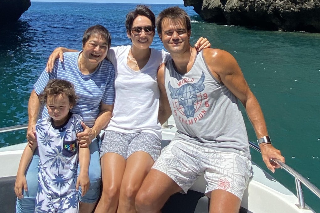 Kim Fenton with her grandson Kyle, daughter Robyn Lamsam and son-in-law Marc Convery in Krabi, Thailand. Fenton has been separated from her family for the past two months. Photo: Kim Fenton