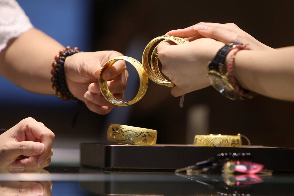 A customer looks at jewellery at a shop in Tsim Sha Tsui in July 2018. Hong Kong’s jewellery manufacturers contributed 16.7 per cent to the city’s domestic exports in 2018. Photo: Winson Wong