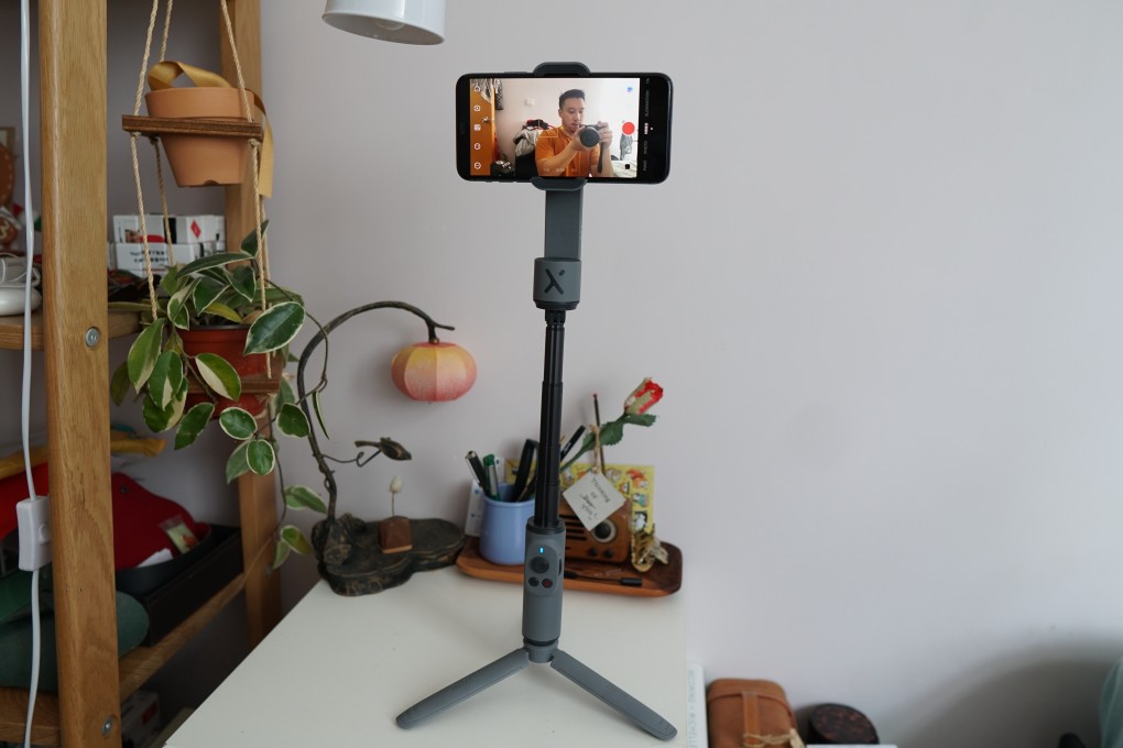 The Zhiyun Smooth X is the smallest powered smartphone gimbal in the world. It has an extendable “neck” like a selfie stick. Photo: Ben Sin