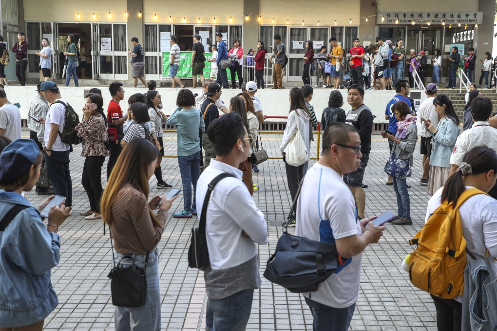 People queue up to vote in last November’s district council election at polling stations in Lek Yuen Estate. Photo: Winson Wong