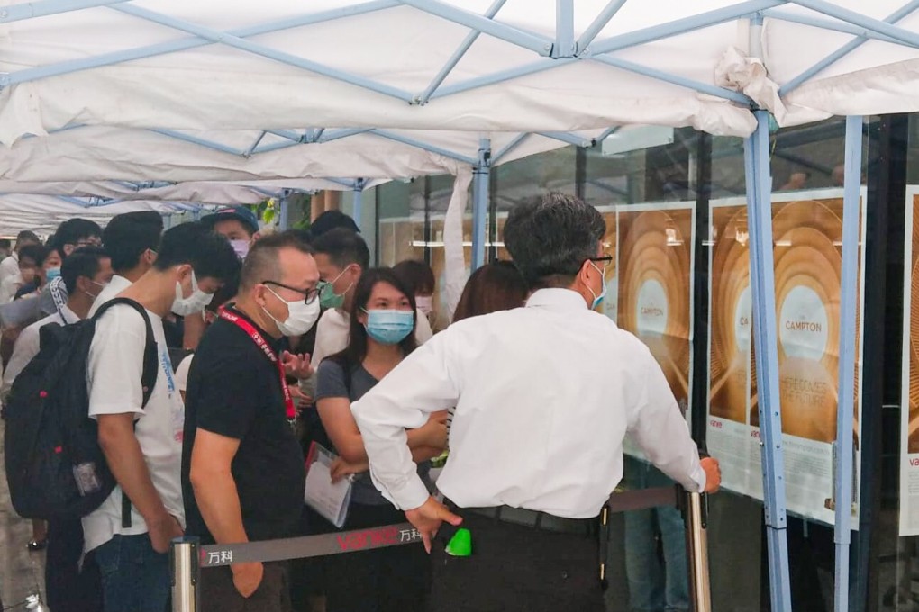 Homebuyers queue up Vanke’s sales office for a chance to buy flats at its The Campton residential project in Cheung Sha Wan. Photo: Handout