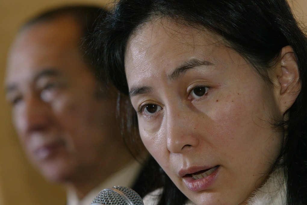 Stanley Ho (left, background) and Pansy Ho (foreground, right) at Shun Tak Holdings’ media conference on 19 January 2006. Photo: SCMP