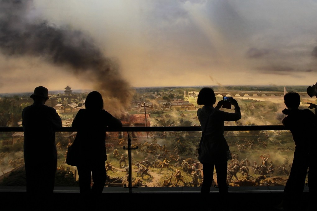 Visitors look at an interactive panorama of the Marco Polo Bridge incident, which sparked the Second Sino-Japanese war, at a memorial museum in Wanping town, west of Beijing, in 2015. Photo: Simon Song