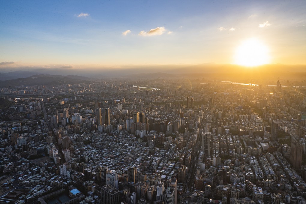 The sunset with downtown Taipei on the foreground, as seen from the observatory deck of the Taipei 101 skyscraper in Taiwan in August of last year. The government will unveil new incentives to attract fresh capital and talent in the island’s semiconductor industry. Photo: EPA-EFE