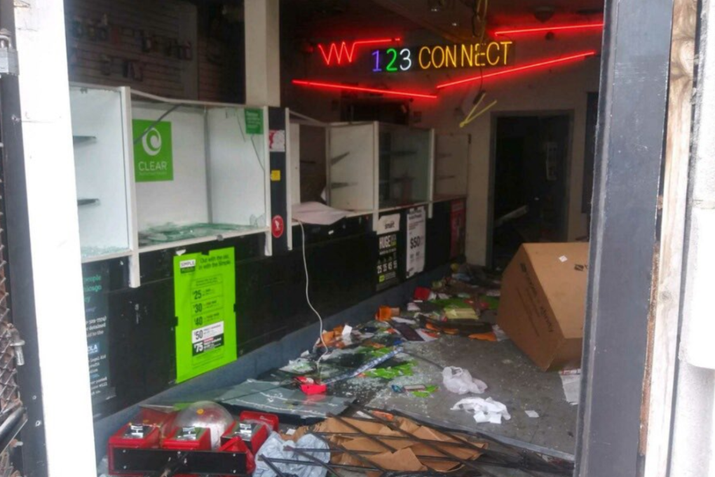 UFC fighter Belal Muhammad's father returns to his Chicago shop after it has been looted and vandalised amid the Black Lives Matter protests happening around the US. Photo: Twitter / Belal Muhammad