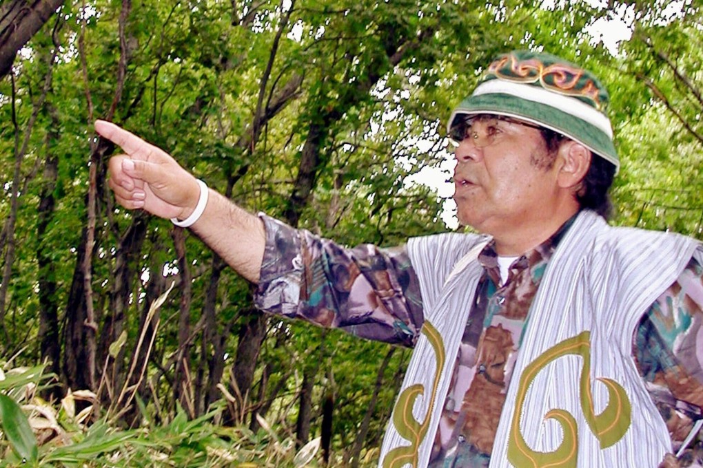 Japanese indigenous Ainu tour guide Yoshiji Ishii at work near the town of Shari, on the northern island of Hokkaido. Photo: AFP