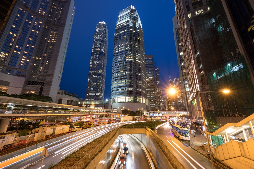 Macquarie Bank has surrendered office space in One IFC (centre), a grade A tower in Central. Photo: SCMP