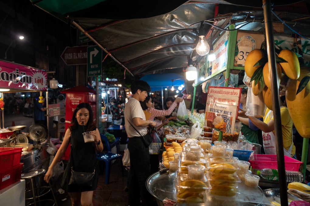 A stall selling mango sticky rice on Yaowarat Road at night in Bangkok, Thailand. “I love the vibes here and all the neon lights on the streets welcoming you,” says Italian Sofia Lisi, a Hong Kong-based marketing director. Photo: Bloomberg