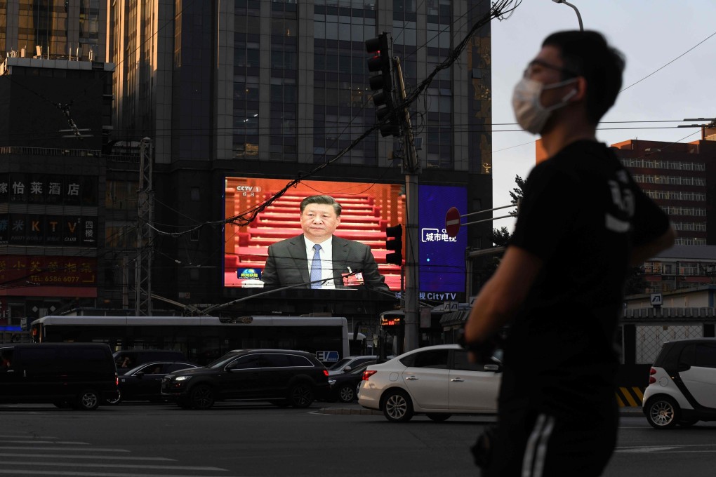 A giant screen in Beijing shows President Xi Jinping during the closing session of the National People’s Congress on May 28. Photo: AFP