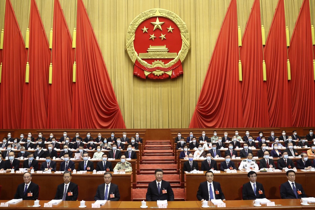 Chinese President Xi Jinping and other officials attend the opening session of the National People's Congress at the Great Hall of the People. Xi has crushed factional struggles in the CCP, but in so doing has created his own personal faction. Photo: Xinhua via AP