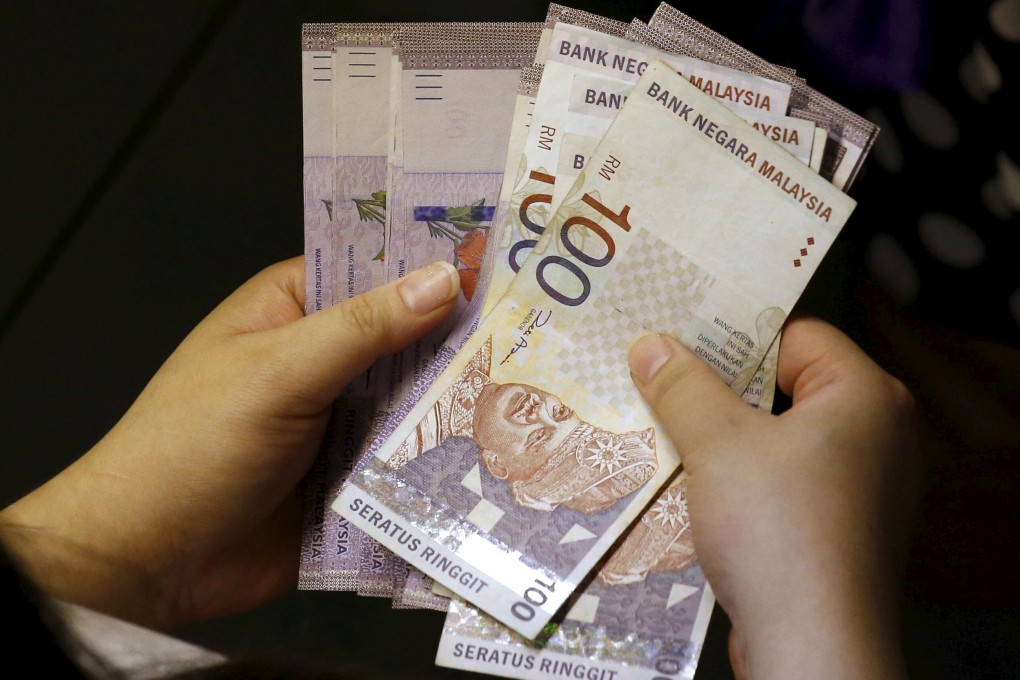 Singapore is generally regarded as a safe haven for investors in Asia, and is therefore an attractive hub for foreign currencies. Photo: Reuters