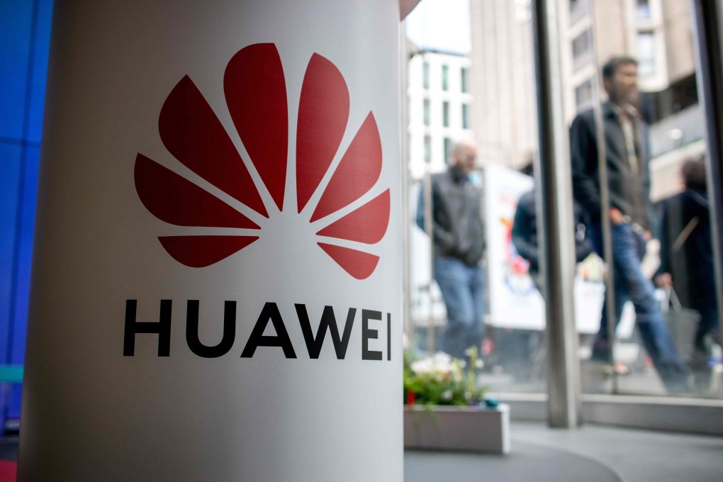 Pedestrians walk past a Huawei Technologies product stand at a shop of mobile network operator EE, part of the BT Group, in central London in April of last year. Photo: Agence France-Presse