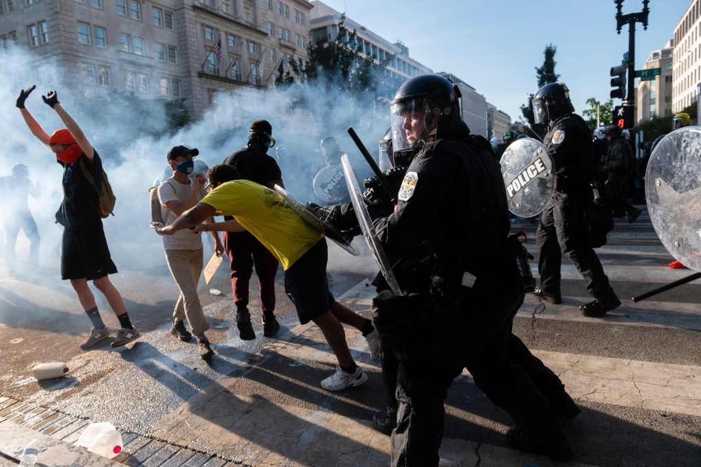 US Park Police push back protesters near the White House on June 1 as demonstrations against George Floyd's death continue. Photo: AFP