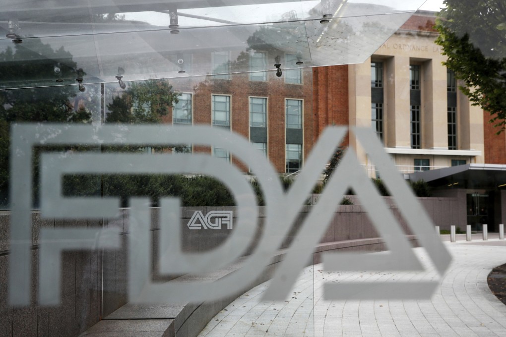 The US Food and Drug Administration building is seen behind its logo at a bus stop on the agency's campus in Silver Spring, Maryland. Photo: AP