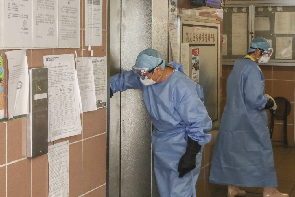 Cleaners in protective gear disinfect Lek Yuen Estate in Sha Tin. Photo: K.Y. Cheng