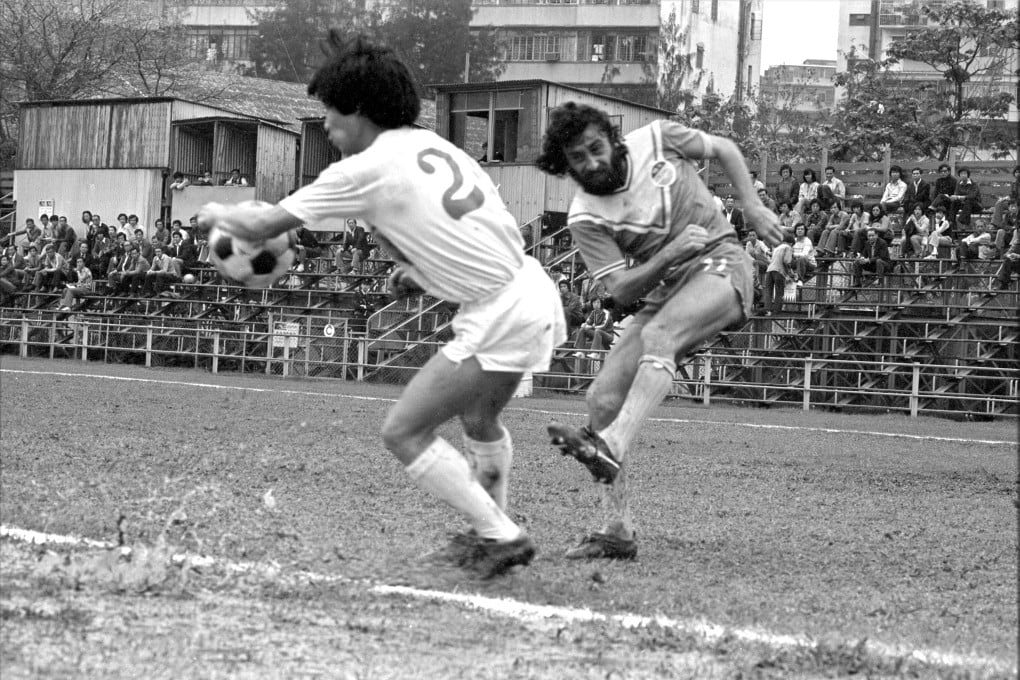 Seiko's Derek Currie (right) takes a shot but is blocked by Western Youth’s Cheung Chi-ming in a game played in April 1978. Photo: SCMP