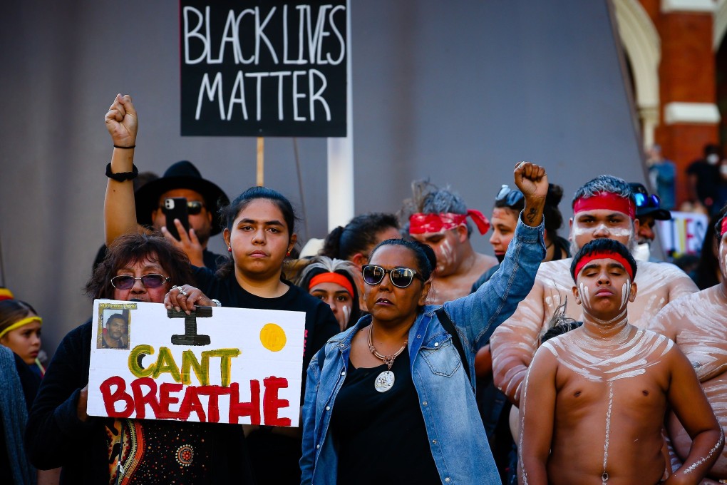 Demonstrators attend a Black Lives Matter protest in Brisbane on June 6, 2020. Photo: AFP