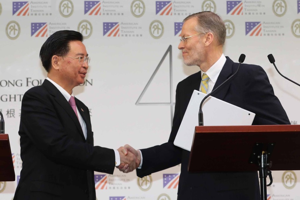 Taiwanese Foreign Minister Joseph Wu, pictured with Brent Christensen of the American Institute in Taiwan, says 500 representatives from 38 countries have taken part in GCTF workshops. Photo: CNA